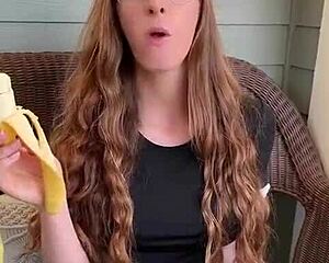 Redhead Long Hair Devours Banana Hungrily