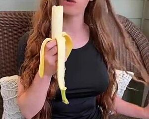 Redhead Long Hair Devours Banana Hungrily