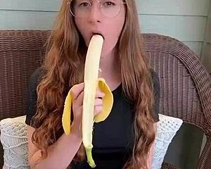 Redhead Long Hair Devours Banana Hungrily