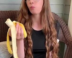Redhead Long Hair Devours Banana Hungrily