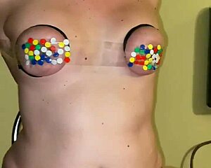 Bound submissive tits slapped hard in intense bdsm bondage session.