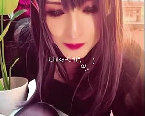 black-haired crossdressing ladyboy masturbates quietly in public toilet