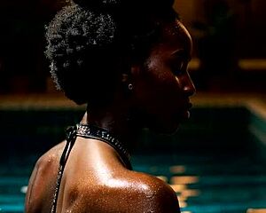 Ebony babe in bikini takes big cocks doggystyle bent over pool then missionary threesome