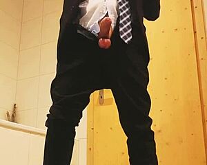 guy strokes off in tight business suit on webcam