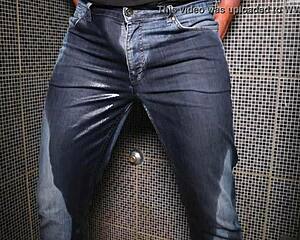 dude soaks jeans peeing then blasts cumshot right there outdoors