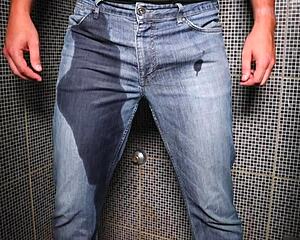 dude soaks jeans peeing then blasts cumshot right there outdoors