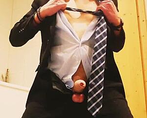 guy strokes off in tight business suit on webcam