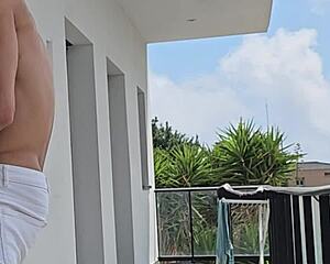 neighbors watching as tommy cabrio fucks my big tits on the balcony?