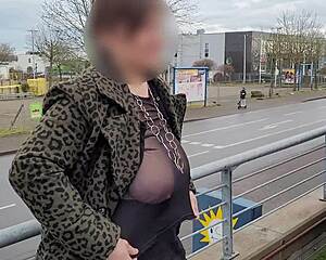 MILF FLASHES HUGE SAGGY TITS STREET!