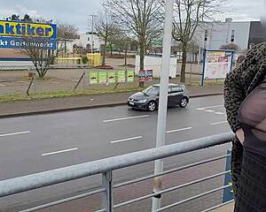 MILF FLASHES HUGE SAGGY TITS STREET!