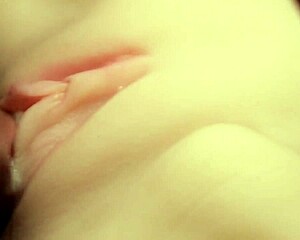 Flushing lube deep in her big shaved pussy feels so intense