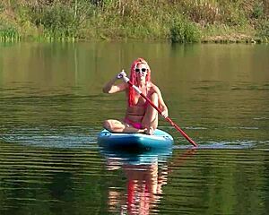 skinny slut flashes small tits in pink micro bikini outdoors