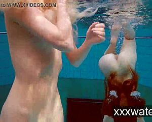 Milana and Katrin rip bikinis stripping nude underwater at beach pool