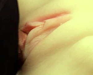 Flushing lube deep in her big shaved pussy feels so intense