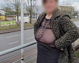 MILF FLASHES HUGE SAGGY TITS STREET!