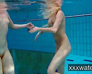 Milana and Katrin rip bikinis stripping nude underwater at beach pool
