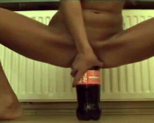 Eager amateur teen slides thick bottle deep into wet pussy during homemade masturbation session