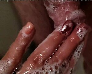 Stepbrother Gets Shower Handjob While Wife's Away
