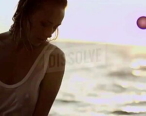 blonde russian on beach with wet see-through bra nipples showing salt skin