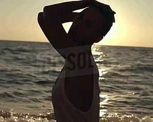 blonde russian on beach with wet see-through bra nipples showing salt skin