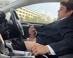 Whoa stroking this monster cock bulging in the car!