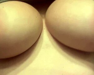 italian milf artemisia love bounces her huge natural nipples in slow motion bedroom solo