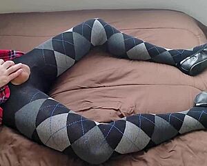 shemale strokes huge cock in plaid dress and tight argyle leggings