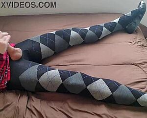 shemale strokes huge cock in plaid dress and tight argyle leggings