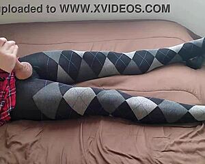 shemale strokes huge cock in plaid dress and tight argyle leggings