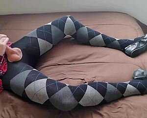 shemale strokes huge cock in plaid dress and tight argyle leggings