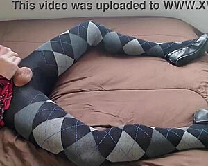 shemale strokes huge cock in plaid dress and tight argyle leggings