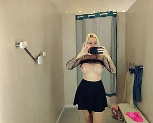 Young blonde flashes puffy big tits begging for fitting room fuck right now