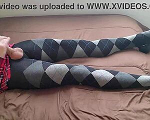shemale strokes huge cock in plaid dress and tight argyle leggings