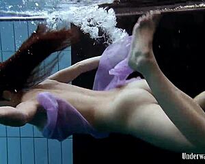 Aneta Splashes Big Tits in Purple Dress Underwater Pool Play