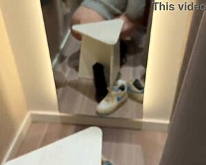 hey, this naughty girl flashes her big ass in the store, plays with cock, then gets doggy fucked in changing room