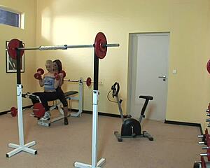 two wet pussy sluts with long and short hair lick each other's natural tits in steamy gym lesbian session