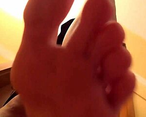 Tall giantess goddess teases with her huge perfect feet in close-up POV worship.