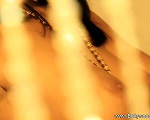 Brunette Indian Strips Teasingly Ripping Clothes in Arousing Dance
