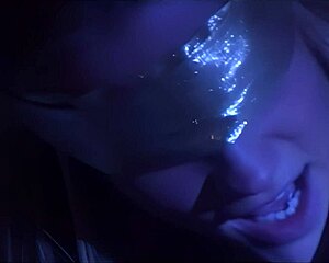 A blindfolded beauty rides mysterious lover's cock doggystyle in bedroom