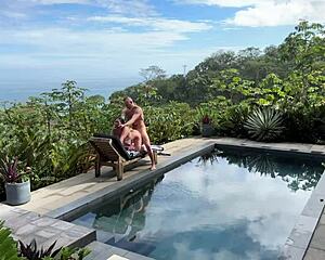 amateur asian couple films public pool doggystyle ending in facial cumshot