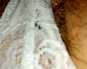 retro blue film captures steamy undressing and nude posing in classic erotic style