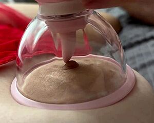 crazy vacuum tongue laps her big natural tits nipples sweetly in bed