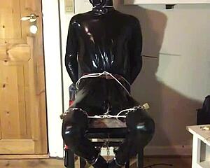 trimmed latex masked handcuff costume scene close up