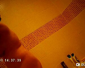 hidden cam spies on her nude shower tits bath