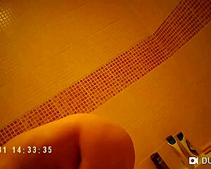 hidden cam spies on her nude shower tits bath