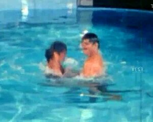 Hot unmarried couple chills and flirts poolside in sexy wedding vibes