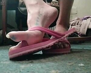 huge talons on exotic curvy feet with long nails in flip flops sexy toes display.