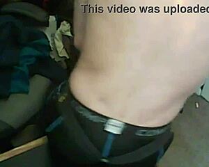 stretching skinny legs in compression tights with bound massage gun