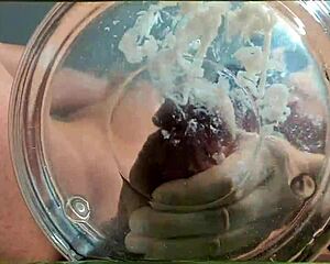 gilf gets slowmo cumshot in water from her friend's huge cock handjob finish