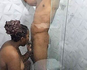 a hot shower with my beautiful stepsister turns steamy as she licks my cock in the bathroom dorm